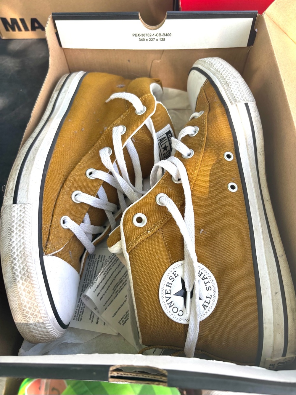 Converse High-Top Sneakers in Mustard Yellow